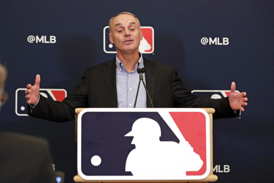 MLB Commissioner Rob Manfred answers questions at a press conference during MLB baseball owners meetings, Thursday, Feb. 6, 2020, in Orlando, Fla. (AP Photo/John Raoux)