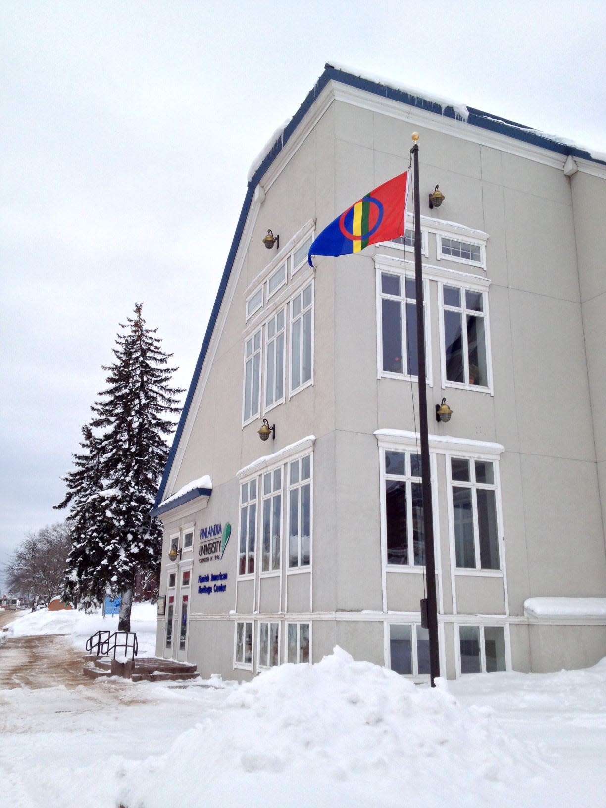 A Sámi flag flies outside Finlandia University in Hancock, in celebration of Sámi National Day.