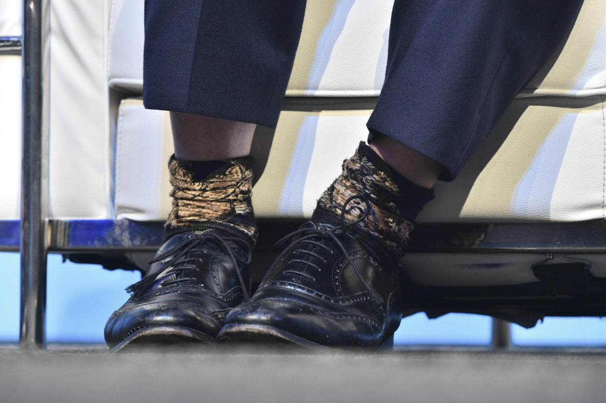 Conservative party leadership candidate Boris Johnson wearing one sock inside out, during the first party hustings at the ICC in Birmingham, England, Saturday June 22, 2019. The two finalists in the race to lead Britain’s governing Conservative Party and become the country’s new prime minister made their first formal pitches to party members Saturday.  (Ben Birchall/PA via AP)