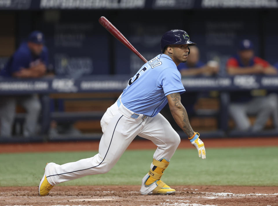 Tampa Bay Rays' Wander Franco singles during his at-bat against the Texas Rangers during the sixth inning of a baseball game Sunday, Sept. 18, 2022, in St. Petersburg, Fla. (AP Photo/Mark LoMoglio)