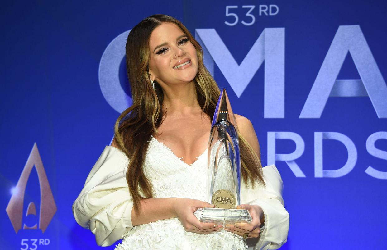 Singer-songwriter Maren Morris poses in the press room with the album of the year award at the 53rd annual CMA Awards at Bridgestone Arena on Wednesday, Nov. 13, 2019, in Nashville, Tenn. (Photo by Evan Agostini/Invision/AP)