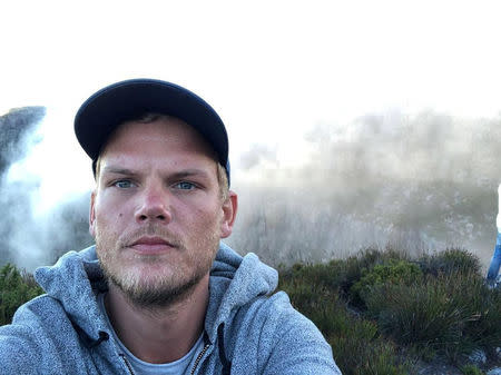 Swedish musician, DJ, remixer and record producer Avicii (Tim Bergling) takes a selfie on Table Mountain, South Africa in this picture obtained from social media January 11, 2018. Instagram/Avicii via REUTERS