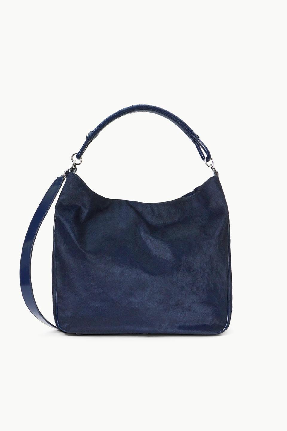 <p><a href="https://go.redirectingat.com?id=74968X1596630&url=https%3A%2F%2Fstaud.clothing%2Fcollections%2Fsale%2Fproducts%2Fperry-hobo-bag-navy&sref=https%3A%2F%2Fwww.harpersbazaar.com%2Ffashion%2Ftrends%2Fg60232316%2Fbazaar-nice-saves-march-20-2024%2F" rel="nofollow noopener" target="_blank" data-ylk="slk:Shop Now;elm:context_link;itc:0;sec:content-canvas" class="link ">Shop Now</a></p><p>Perry Bag</p><p>staud.clothing</p><p>$487.00</p>