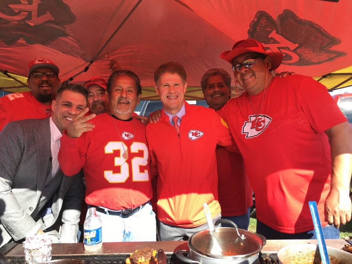 Ricardo Alaniz, back left, at his tailgate before a game against the Green Bay Packers on Nov. 7, 2021. Chiefs owner Clark Hunt saw how much fun they were having and decided to join in.