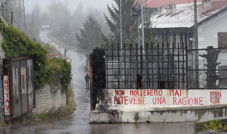 FILE PHOTO: One of the entrances of the construction side of the tunnel of a high-speed train line, known as TAV (Treno Alta Velocita) in Chiomonte, Italy, November 19, 2018. REUTERS/Massimo Pinca/File Photo