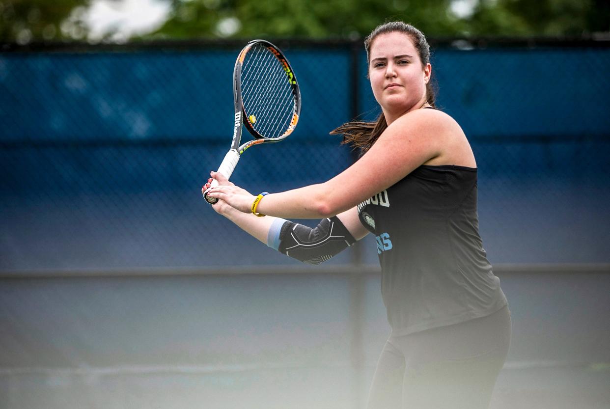 Iryna Trystan, 21, a Ukraine student from Northwood University, prepares to hit the ball during the first official tennis practice of the season at the Gerstacker Tennis Center in Midland on Thursday, Aug. 25, 2022. 