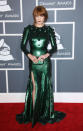 <b>Florence Welch </b><br><br>The Brit singer looked fierce in a Givenchy AW09 Couture bottle green gown with spike detail.