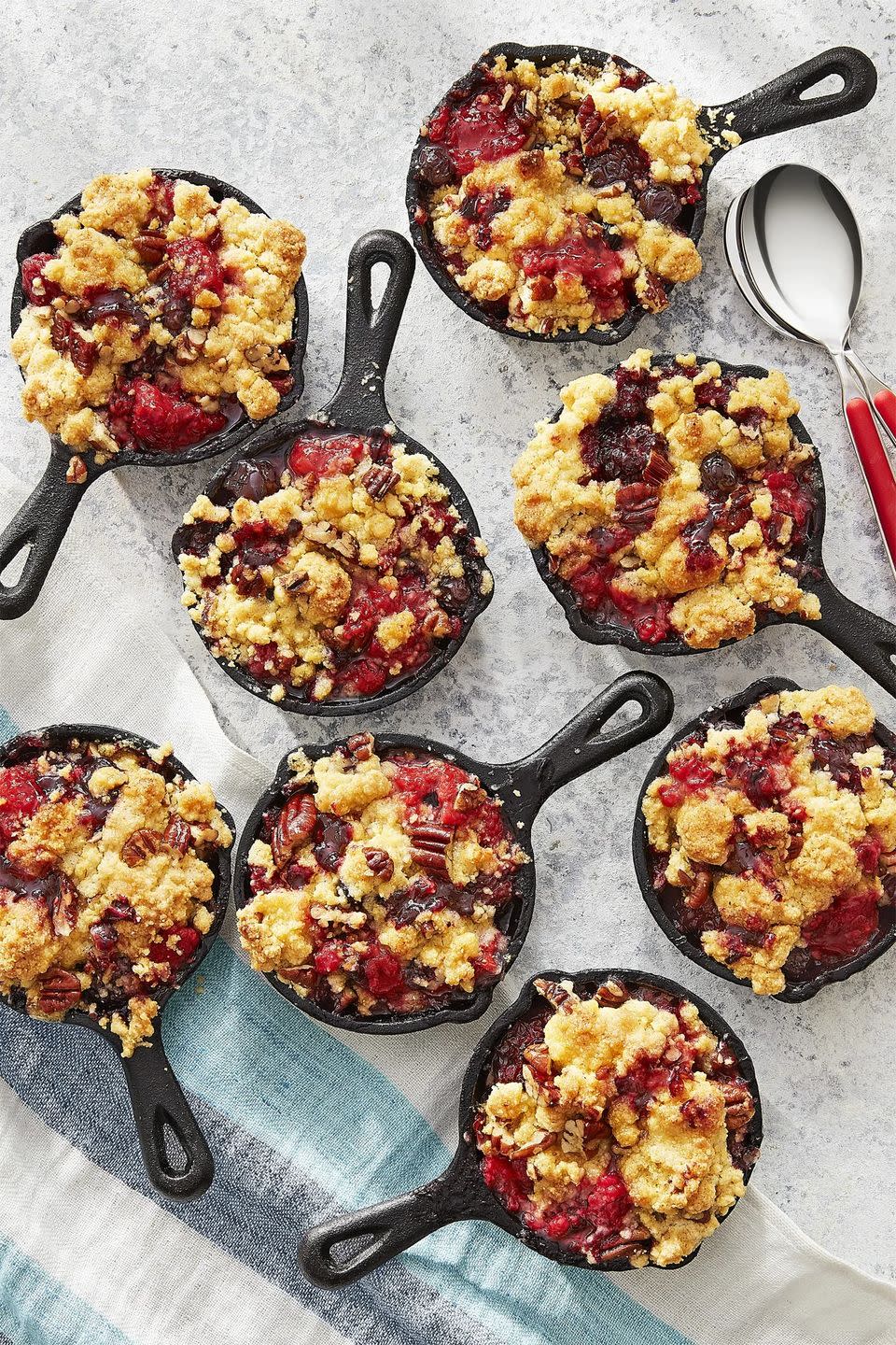 jiffy mixed berry cornmeal cobbler baked in individual mini cast iron skillets