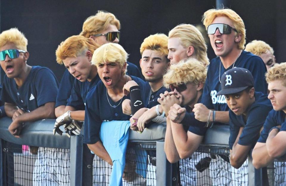 The Bullard dugout yells out in the Central Section DI baseball quarterfinal against Centennial Friday, May 19, 2023 in Fresno. Centennial won 6-2.