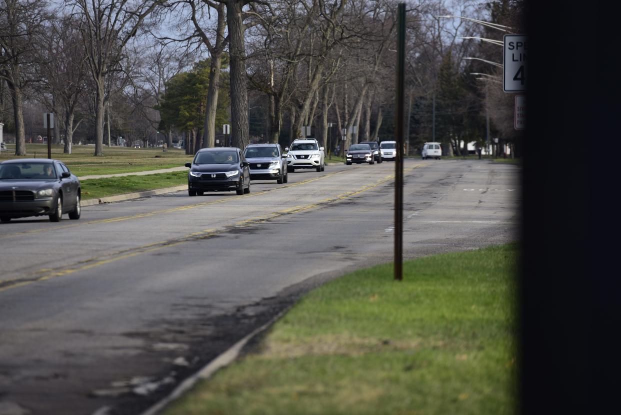 Vehicles pass through Gratiot Avenue and Holland Avenue in Port Huron on Wednesday, April 13, 2022. Reconstruction on Gratiot Avenue between Elmwood Street and Holland Avenue is planned for 2023 as costs for the work came back higher than originally estimated, according to city officials.