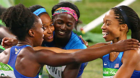 2016 Rio Olympics - Athletics - Final - Women's 4 x 100m Relay Final - Olympic Stadium - Rio de Janeiro, Brazil - 19/08/2016. Tianna Bartoletta (USA) Allyson Felix (USA) English Gardner (USA) and Tori Bowie (USA) of USA celebrate after winning the race REUTERS/David Gray