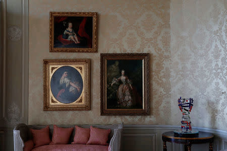 A painting "Portrait of Marquise de Pompadour, 1759" (R) by French painter Francois Boucher (1703-1770) is seen on a wall at the Chateau de Menars, on the River Loire, France November 6, 2017. REUTERS/Gonzalo Fuentes