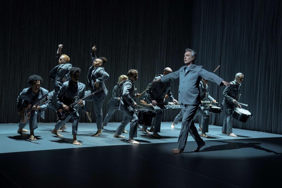 David Byrne and his band, with Giarmo and Kuumba dancing in the background. (Photo: HBO)