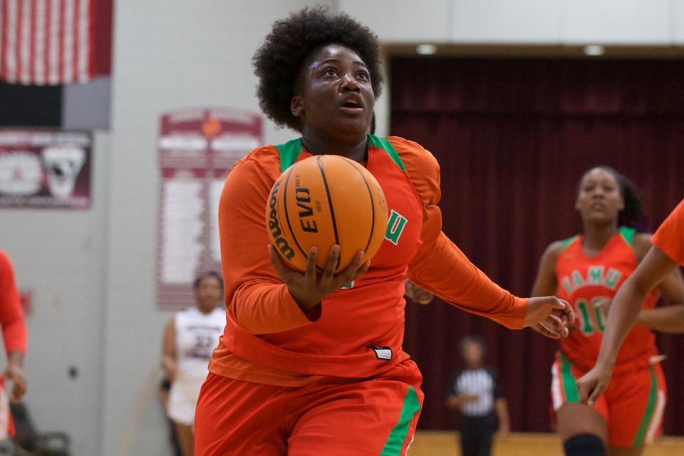 FAMU DRS junior guard Jade Dubose (2) prepares to layup the ball in a game against Madison County on Jan. 22, 2022, at Madison County High School. The Rattlers won 58-31.