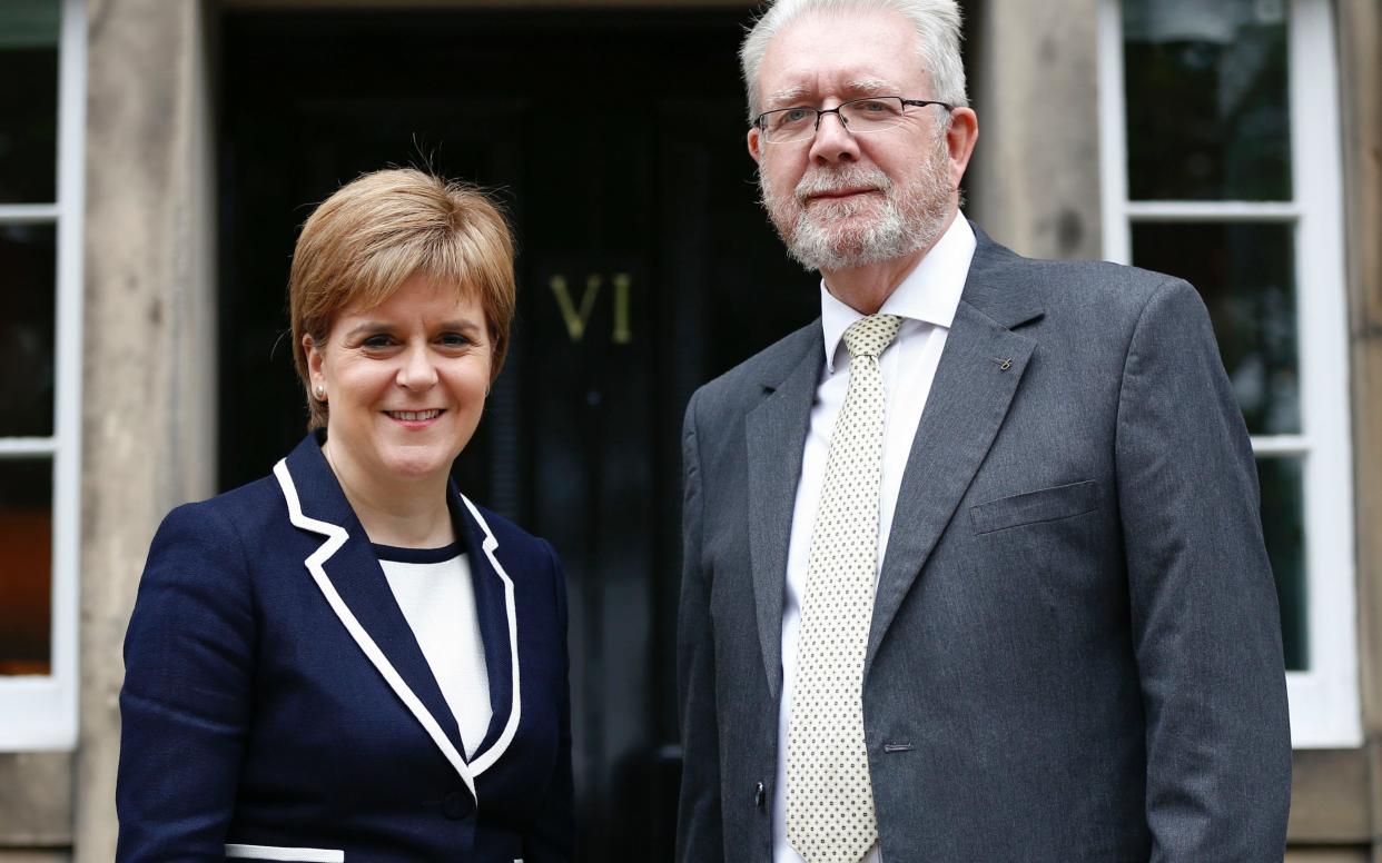 Nicola Sturgeon with Mike Russell, her Brexit Minister - PA