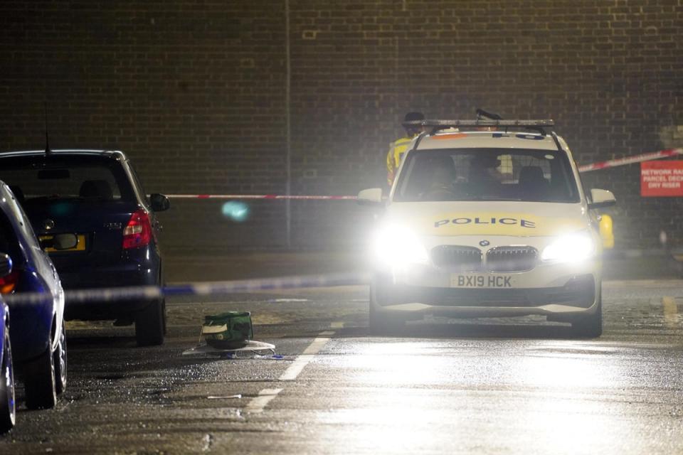 A medical bag is left in position at the scene of the suspected drive-by shooting (PA)