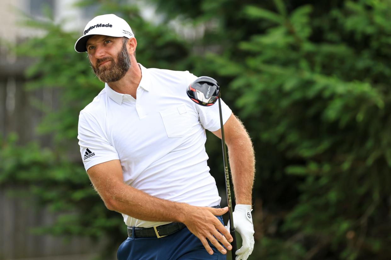 Dustin Johnson watch his shot from the 18th tee during the second round of the U.S. Open at The Country Club on June 18 in Brookline, Mass. Johnson will play in the LIV Golf Invitational — Portland this week along with eight of the top 50 players in the world.