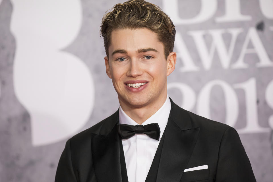 AJ Pritchard poses for photographers upon arrival at the Brit Awards in London, Wednesday, Feb. 20, 2019. (Photo by Vianney Le Caer/Invision/AP)