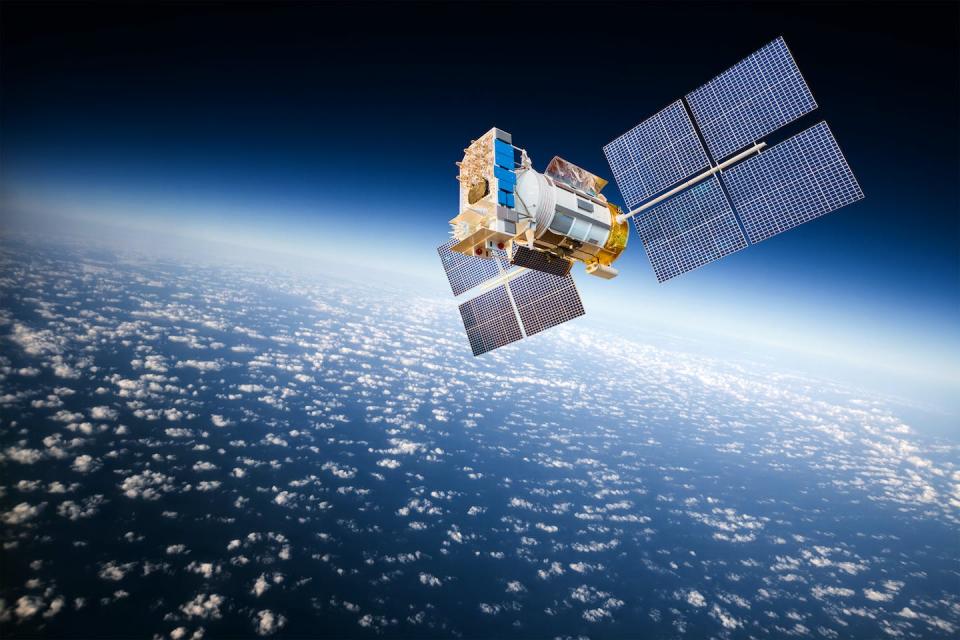 When satellites pass overhead, they transmit signals to smartphones, which enable smartphones to calculate their own location. (Shutterstock)