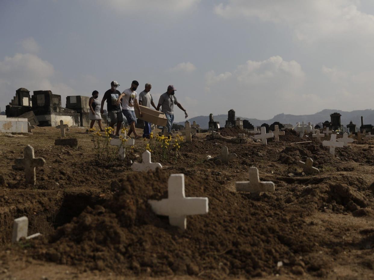 coronavirus death coffin grave cemetery brazil