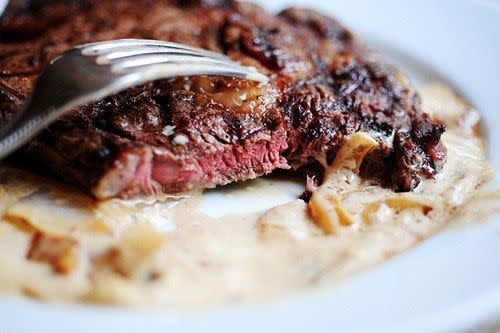 Grilled Ribeye Steak with Onion-Blue Cheese Sauce