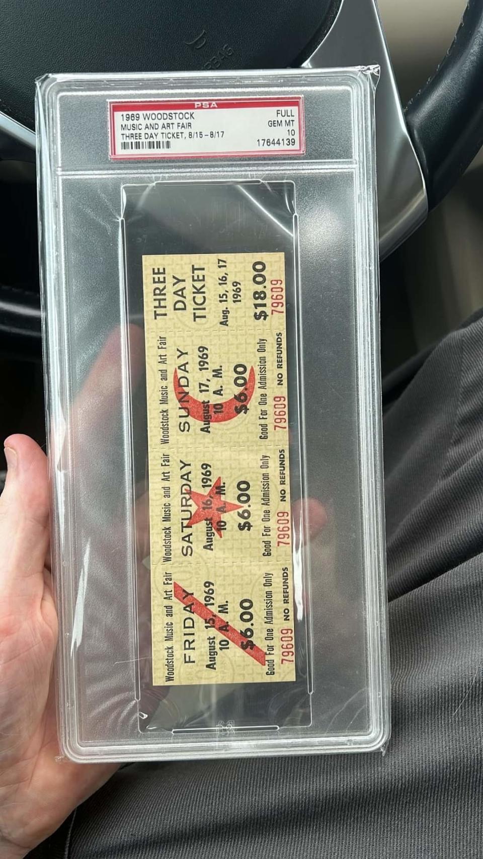 The ticket shows it was for three days and cost $18; it has been sealed in an appraiser container and rated as gem mint 10