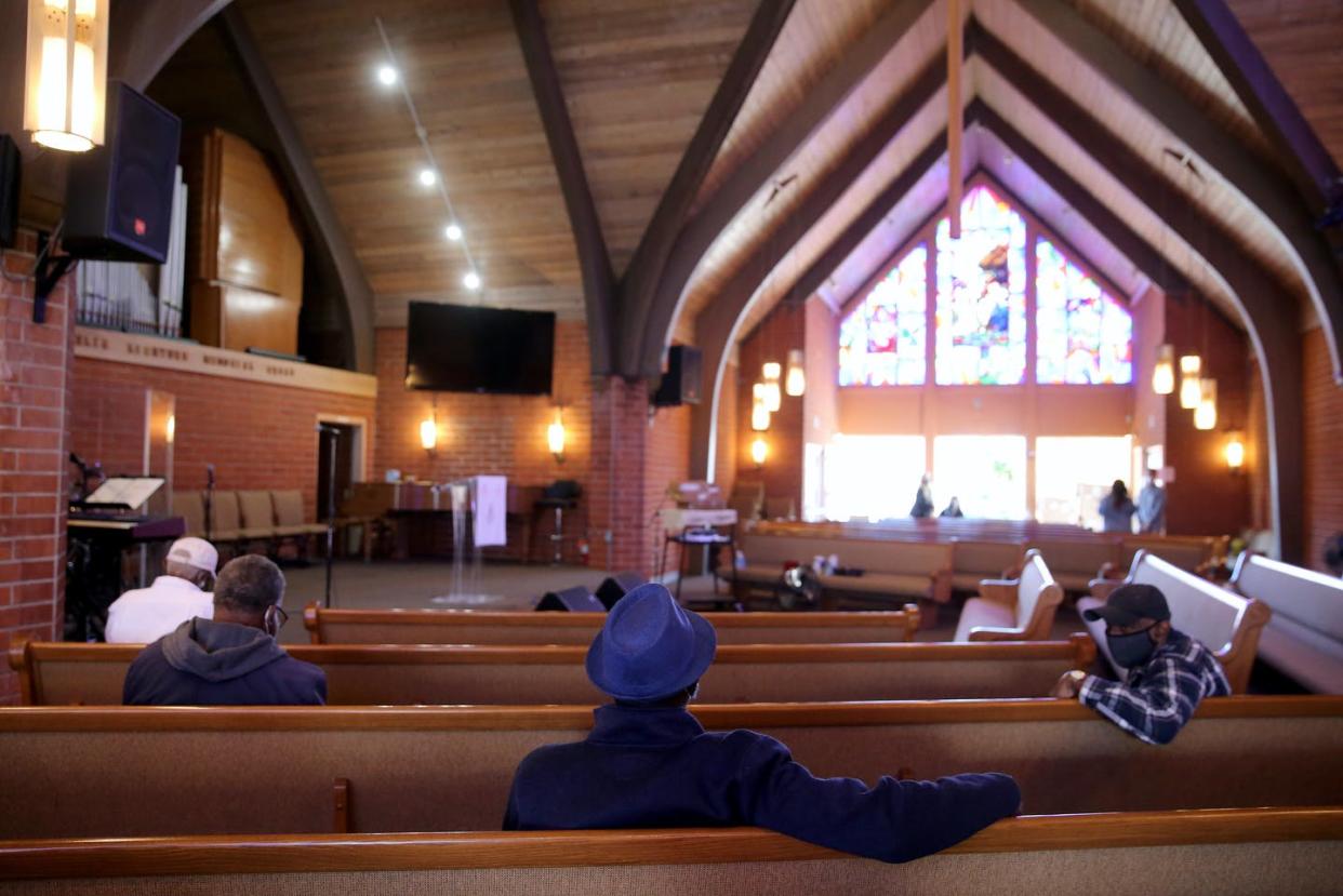 <span class="caption">Church closures were among the most contested measures brought in to fight COVID-19</span> <span class="attribution"><a class="link " href="https://www.gettyimages.com/detail/news-photo/larry-green-sits-in-the-church-observation-area-after-news-photo/1306756648?adppopup=true" rel="nofollow noopener" target="_blank" data-ylk="slk:Mario Tama/Getty Images;elm:context_link;itc:0;sec:content-canvas">Mario Tama/Getty Images</a></span>