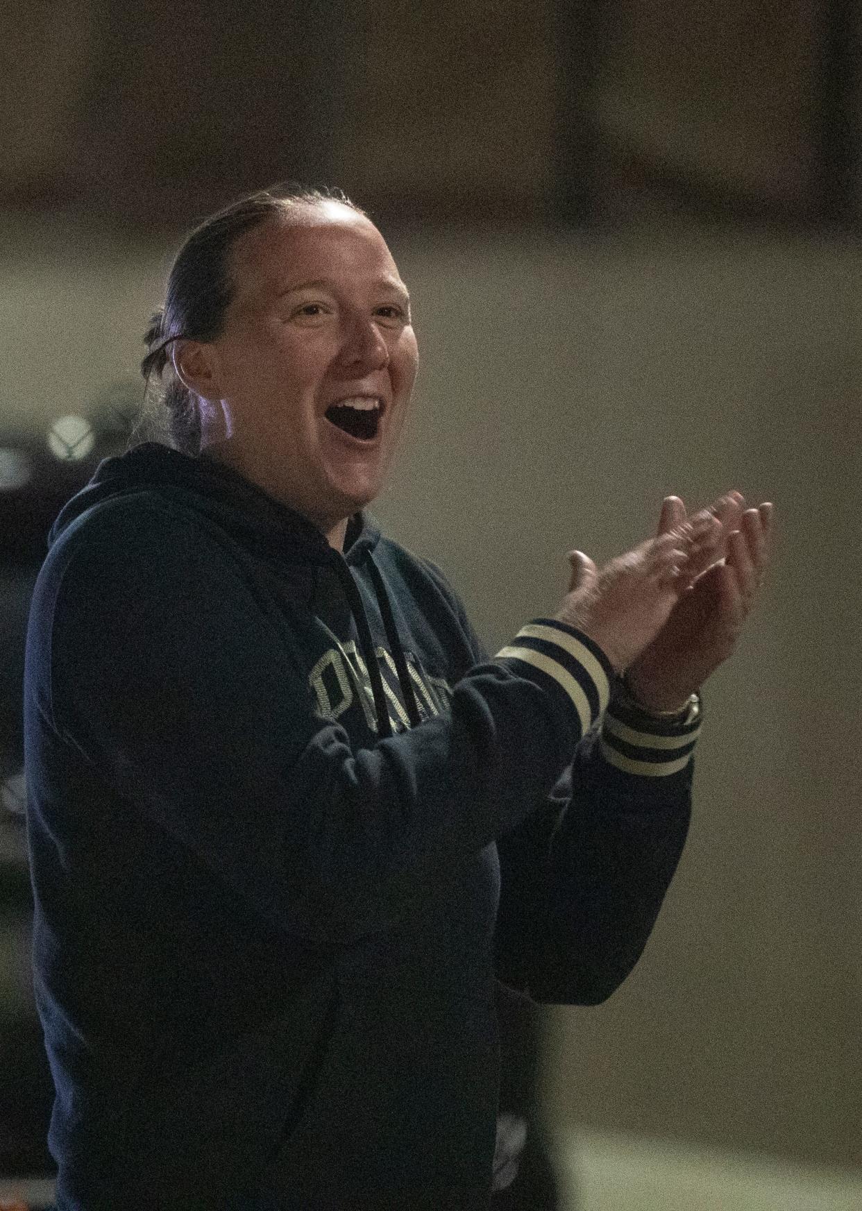 Purdue women’s basketball coach Katie Gearlds welcomes the Purdue Boilermakers men’s basketball team after defeating Tennessee in the NCAA Tournament Elite Eight game, Sunday, March 31, 2024, at Purdue University Airport in West Lafayette, Ind.