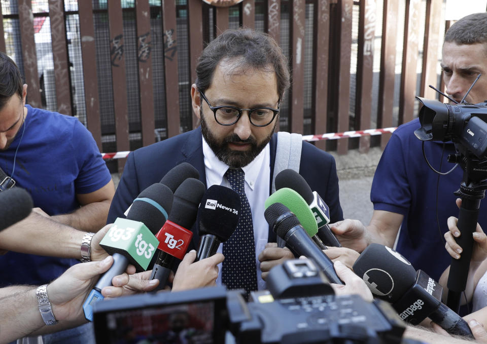 Massimo Ferrandino, lawyer of the widow of police officer Mario Cerciello Rega speaks to reporters outside Rome's courthouse, Monday, Sept. 16, 2019. The lawyers for one of two American teenagers being held in the July slaying of the police officer have dropped a request for their client Gabriel Natale-Hjorth to be released, saying they need more time to study new evidence emerged from the investigation. (AP Photo/Gregorio Borgia)