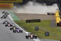 Haas driver Kevin Magnussen of Denmark crashes during the British Formula One Grand Prix at the Silverstone racetrack, Silverstone, England, Sunday, Aug. 2, 2020. (Ben Stansall/Pool via AP)