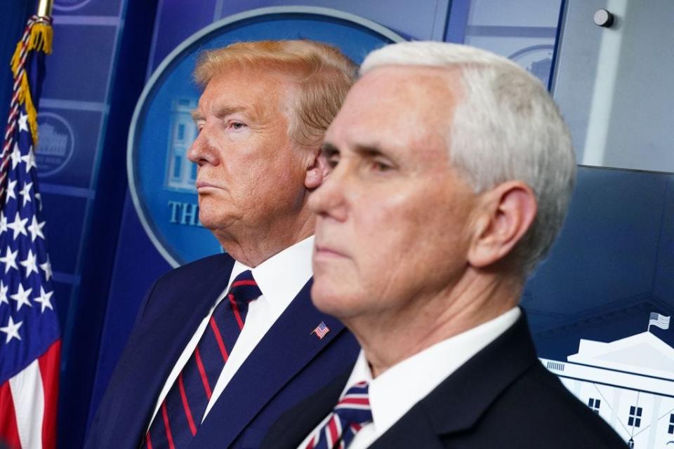 Former President Donald Trump and former US Vice President Mike Pence in the Brady Briefing Room at the White House on April 2, 2020, in Washington, DC.