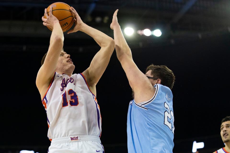 Evansville’s Ben Humrichous (13) takes a shot as the University of Evansville Purple Aces play the Indiana State Sycamores at Ford Center in Evansville, Ind., Wednesday, Feb. 28, 2024.