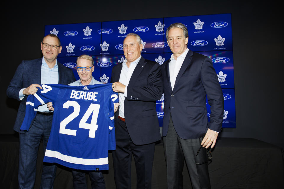 Toronto Maple Leafs GM Brad Treliving, left to right, Maple Leafs Sports and Entertainment CEO Keith Pelley, Maple Leafs new head coach Craig Berube and Maple Leafs president Brendan Shanahan pose for a photo after Berube's introductory press conference in Toronto, Tuesday, May 21, 2024. (Cole Burston/The Canadian Press via AP)