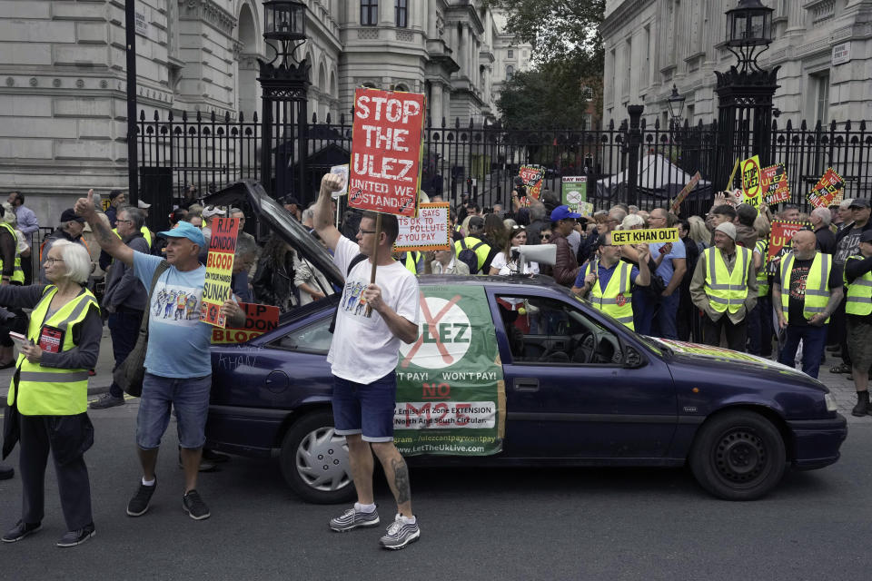 Protesters demonstrate outside the Downing Street against the Ultra-Low Emission Zone (ULEZ) expansion, in London, Tuesday, Aug. 29, 2023. The ULEZ comes into effect. London's Labour mayor Khan is at odd with the Tory PM and his party over the restrictions. (AP Photo/Kin Cheung)