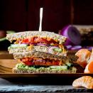 <p>There's no chance of getting the afternoon munchies when you fuel up with this vegan veggie sandwich filled with fiber and healthy fats, plus fruit on the side. It'll keep you energized until dinner. Feel free to swap in your other favorite sandwich vegetables, sprouts or greens.</p> <p> <a href="https://www.eatingwell.com/recipe/259818/veggie-sandwich/" rel="nofollow noopener" target="_blank" data-ylk="slk:View Recipe;elm:context_link;itc:0;sec:content-canvas" class="link ">View Recipe</a></p>