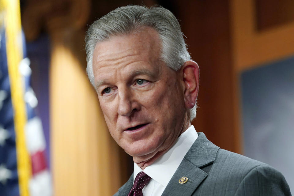 FILE - Sen. Tommy Tuberville, R-Ala., listens to a question during a news conference, March 30, 2022, in Washington. Republican presidential candidates will gather in Alabama on Wednesday, Dec. 6, 2023, for the fourth GOP debate of the 2024 presidential campaign. Alabama's two U.S. senators represent two styles of Republican politics. Tuberville is a Donald Trump acolyte. He talked to Trump from the Senate floor as Trump supporters began storming Capitol Hill on Jan. 6, 2021; now he's blocking military promotions to protest Pentagon policies for servicemembers seeking abortions. (AP Photo/Mariam Zuhaib, File)