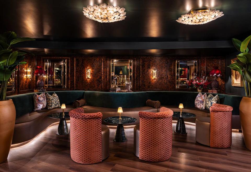The lounge space in the main dining area adjacent to the bar at Lafayette Steakhouse in Miami.