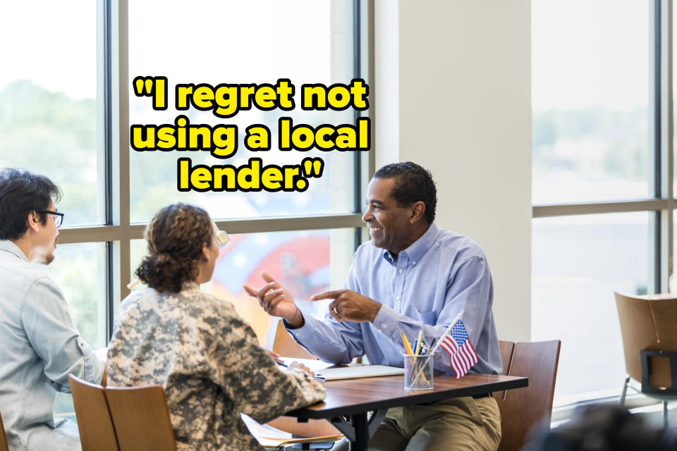 couple talking to a loan officer at a bank