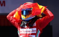 Ferrari's Fernando Alonso celebrates his victory in the Spanish Grand Prix at the Circuit de Catalunya, Barcelona, Spain.