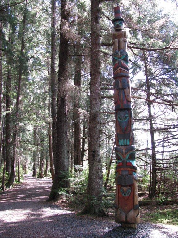 This May 2010 photo shows one of the totems along the history walk at the Sitka National Historical Park in Sitka, Alaska. A must-see in this stunning town is the Sitka National Historical Park. A national monument, it commemorates the 1804 Battle of Sitka between the Tlingit Indians and Russians. Totems _ many of them replicas _ are scattered along the park's two-mile wooded trail. (AP Photo/Becky Bohrer)