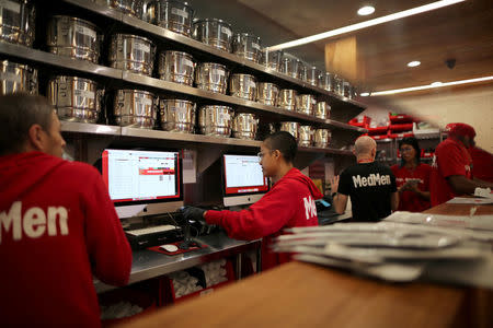 FILE PHOTO: Employees prepare recreational marijuana orders for customers at the MedMen store in West Hollywood, California, U.S., January 2, 2018. REUTERS/Lucy Nicholson/File Photo