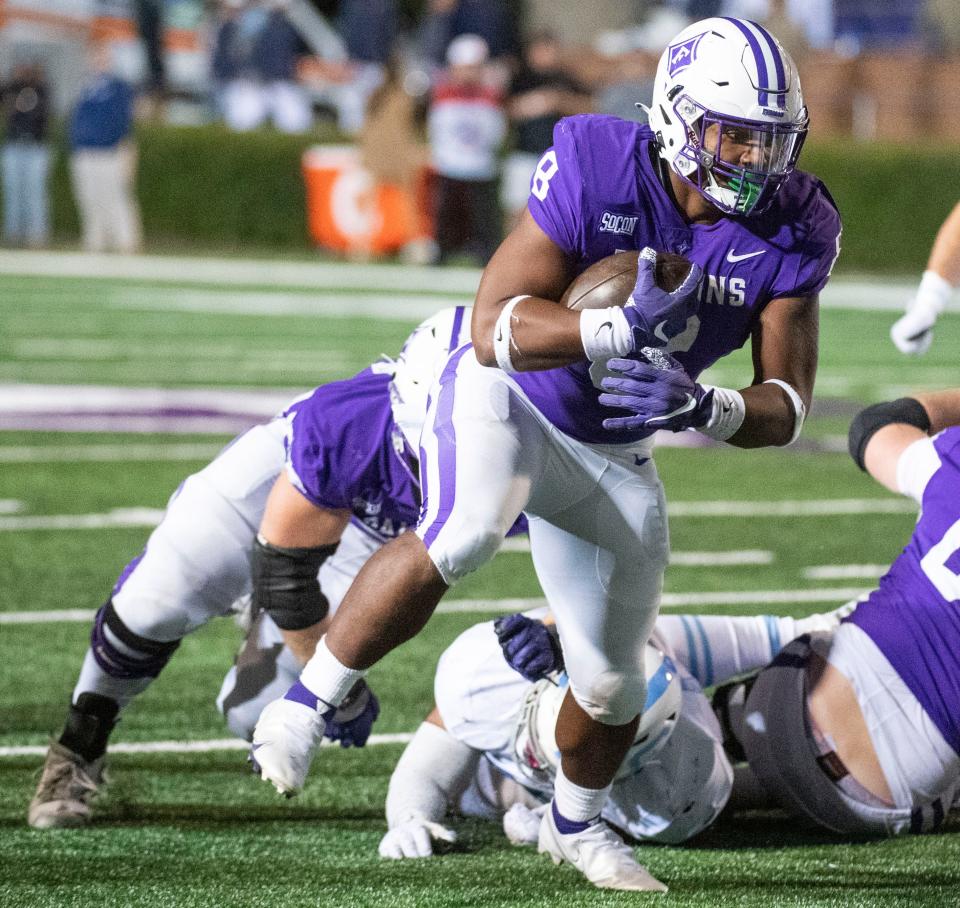 Furman running back Dominic Roberto (8) is one of six Pine Forest graduates on a Division I college football roster ahead of the 2022 season.