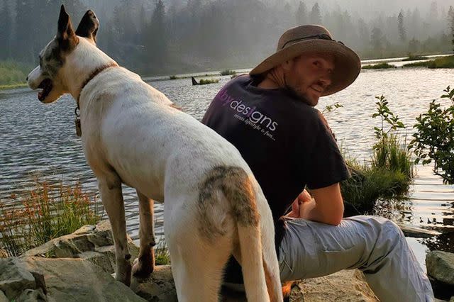 <p>Courtesy of Nadav Schlesinger</p> Nadav enjoying the outdoors with his dog, Josh