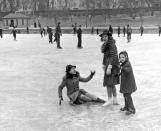<p>Three young girls ice skate on the pond in Central Park in January 1940. </p>