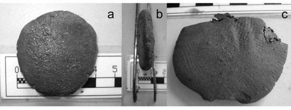 The front (A) and profile (B) of a tablet found in the shipwreck; Impression on the surface of the tablet left by pressure from some kind of fabric (C).