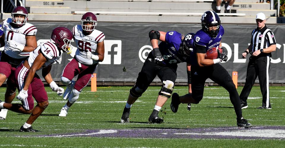 Holy Cross wide receiver Jalen Coker breaks free for a touchdown earlier this season against Fordham.