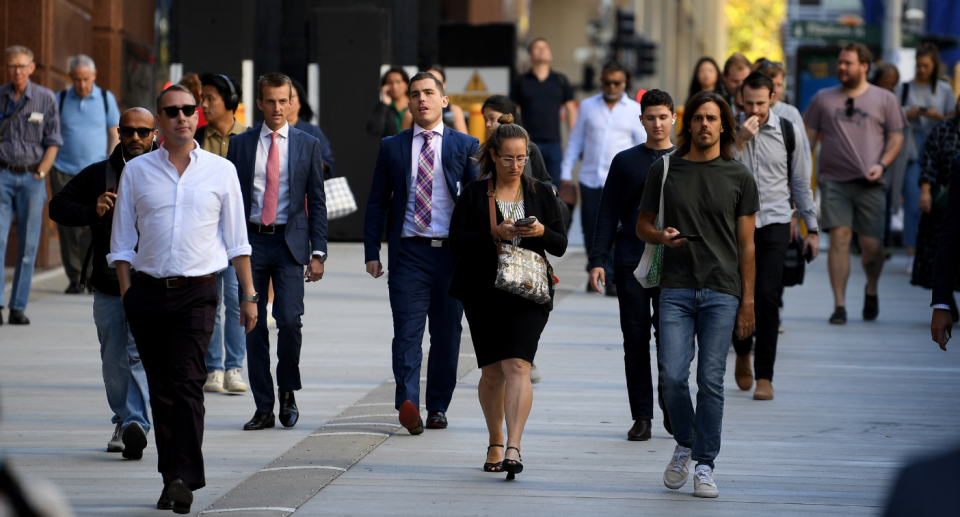 Australian workers walking in the city. Work from home and work from office concept.