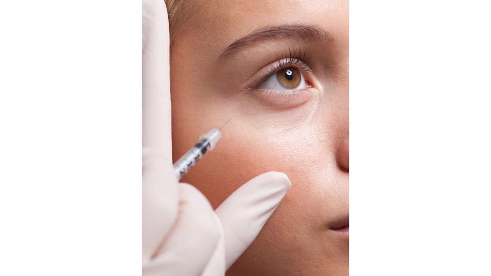 Woman receiving botox injection 