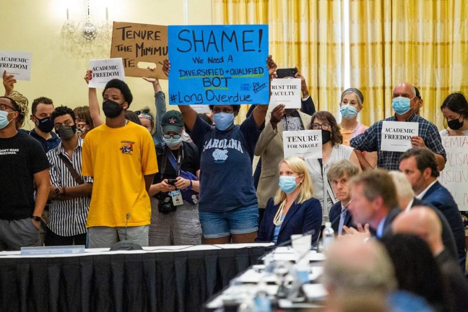 Demonstrators protest at a UNC-Chapel Hill trustees meeting Wednesday, June, 30, 2021 as the board prepared to discuss and vote on tenure for distinguished journalist Nikole Hannah-Jones.