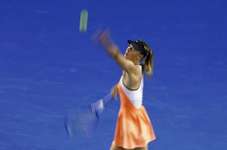 Russia's Maria Sharapova serves during her fourth round match against Switzerland's Belinda Bencic at the Australian Open tennis tournament at Melbourne Park, Australia, January 24, 2016. REUTERS/Jason O'Brien Action Images via Reuters